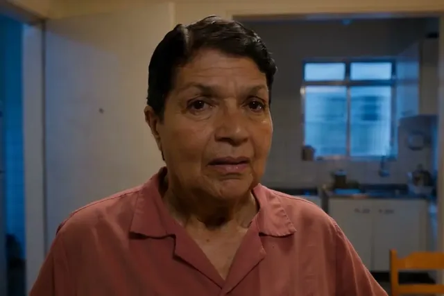 Still from Maria's demo film: an older Brazilian woman in her kitchen